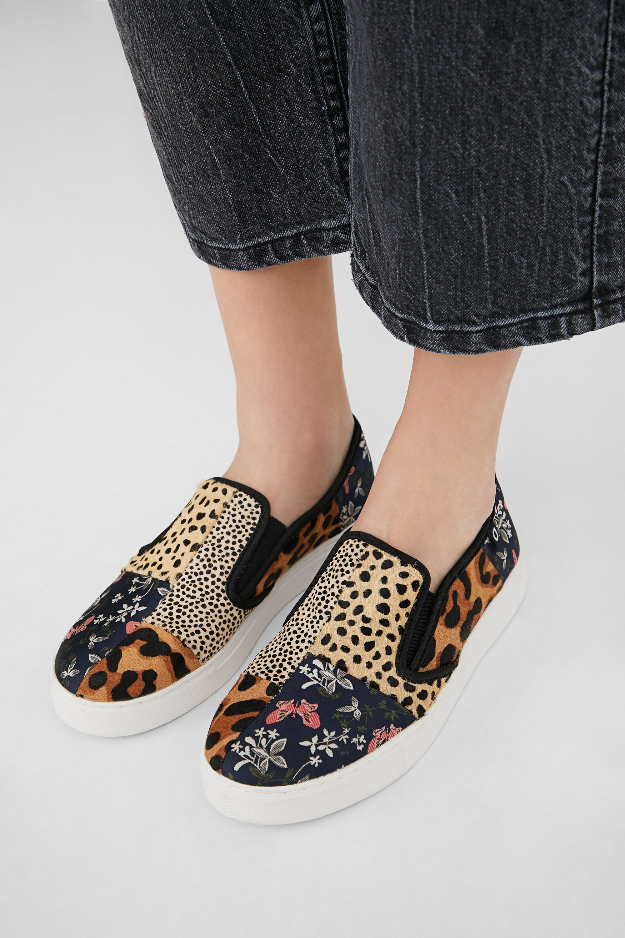 Sneakers slip on de piel