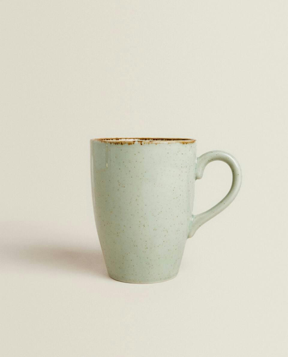 PORCELAIN MUG WITH ANTIQUE FINISH RIM