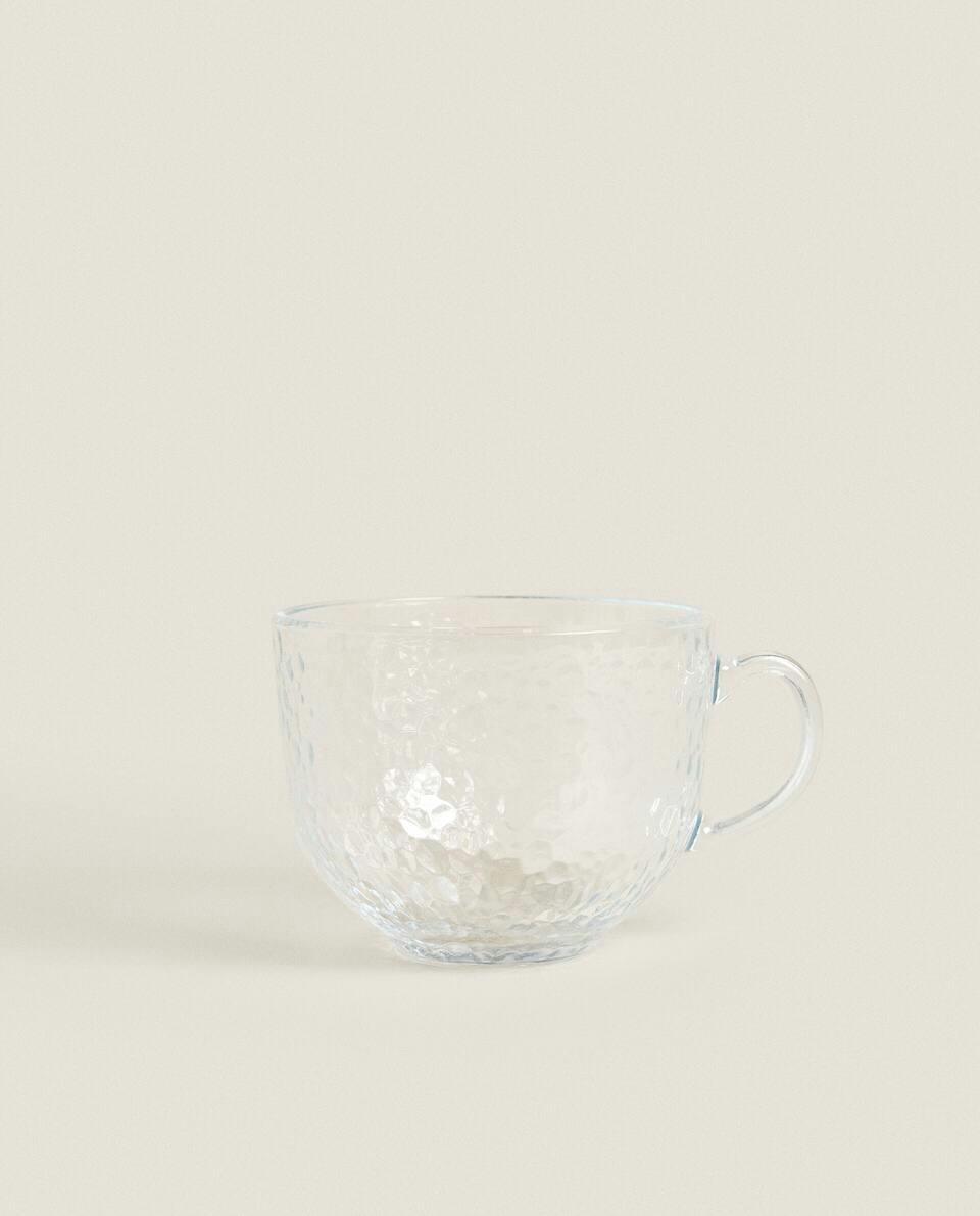 GLASS CUP WITH RAISED DESIGN