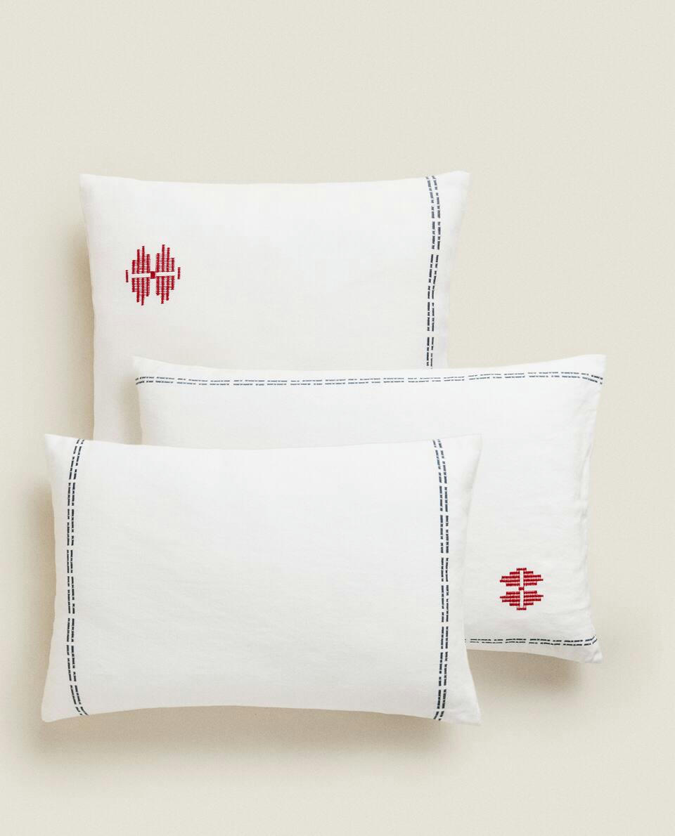 EMBROIDERED CUSHION COVER