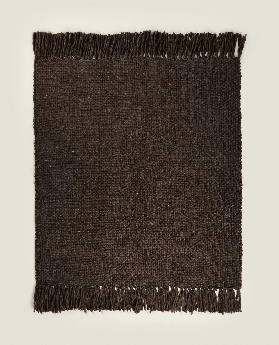 FRINGED KNIT BLANKET