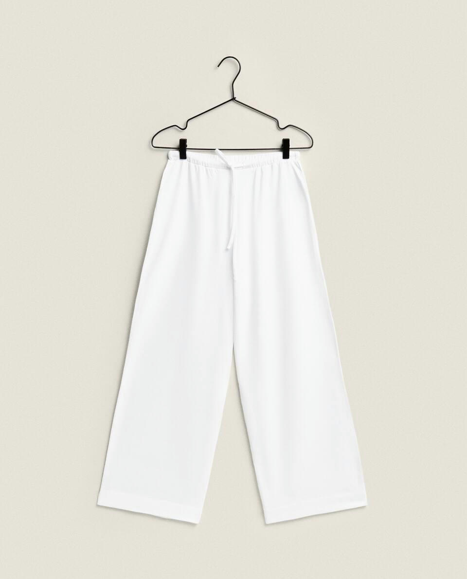 COTTON TROUSERS WITH PIPING