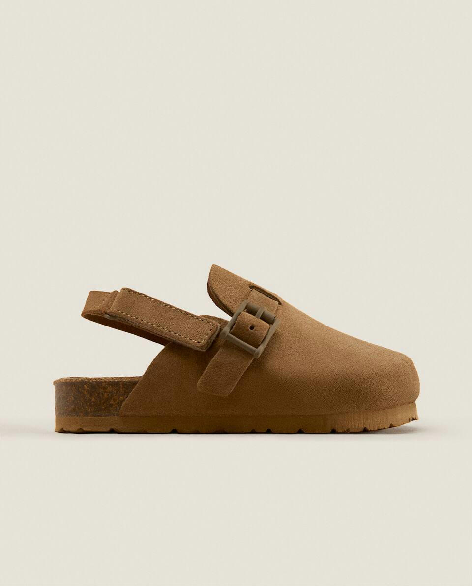 BUCKLED LEATHER CLOGS