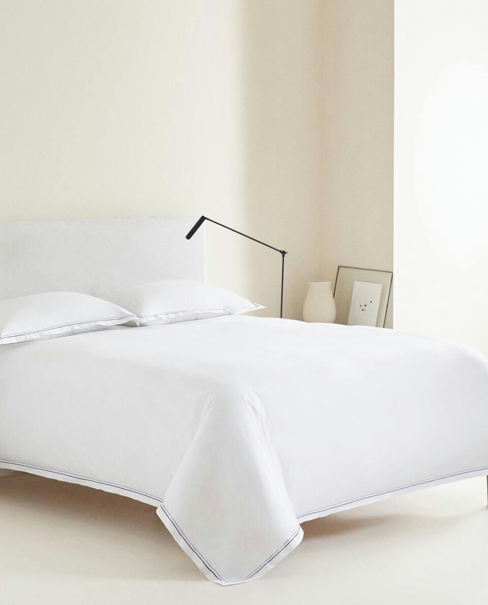 DUVET COVER WITH TWO EMBROIDERED DETAILS