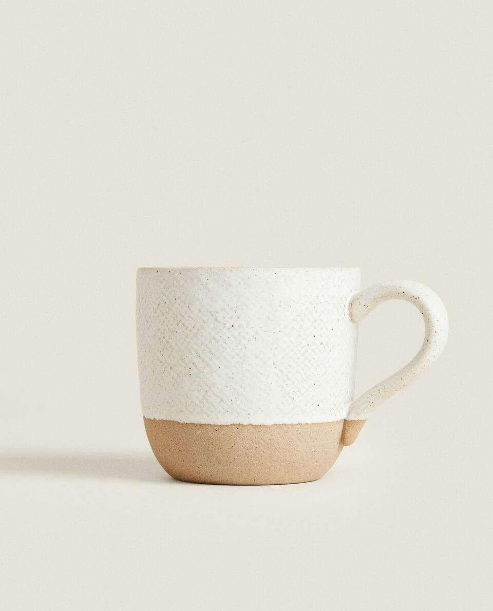 MUG WITH RAISED DESIGN
