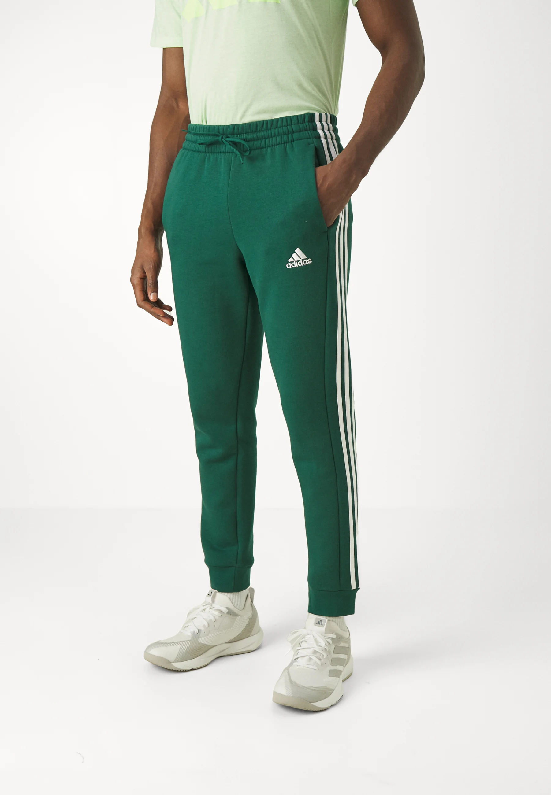 Sportswear ESSENTIALS TAPERED CUFF PANTS - Pantaloni sportivi