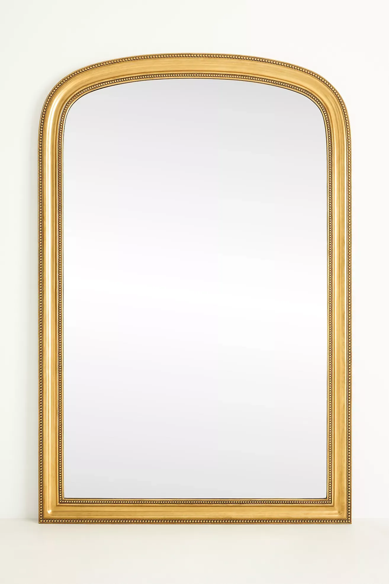 The Gleaming Louie Beaded Arched Floor Mirror
