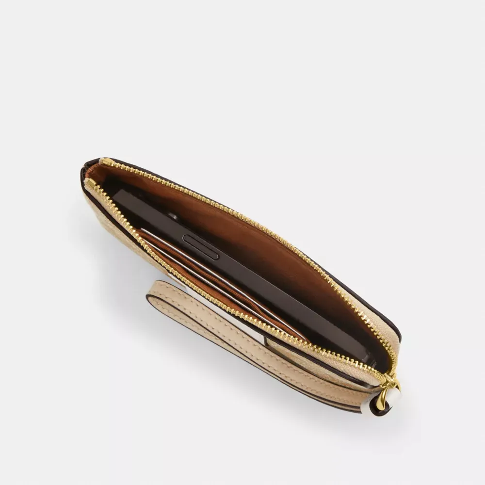 Corner Zip Wristlet In Signature Canvas With Heart Print