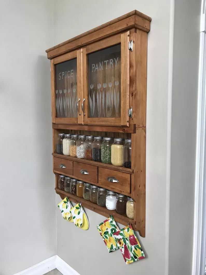 Forever Tulips, spice rack, spice pantry, spice cabinet, chefs pantry, kitchen cupboard, custom kitchen cabinet with frosted glass doors.