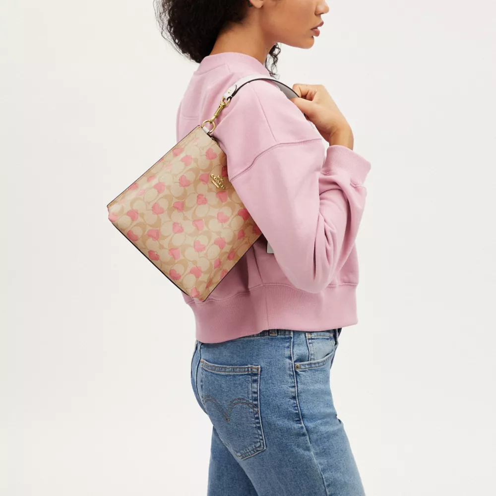 Mollie Bucket Bag 22 In Signature Canvas With Heart Print
