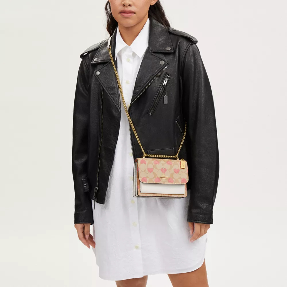 Mini Klare Crossbody In Signature Canvas With Heart Print