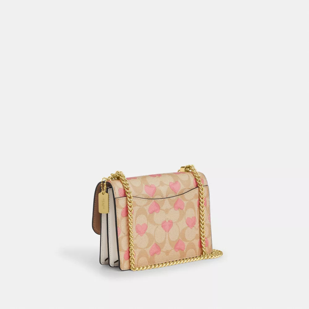 Mini Klare Crossbody In Signature Canvas With Heart Print
