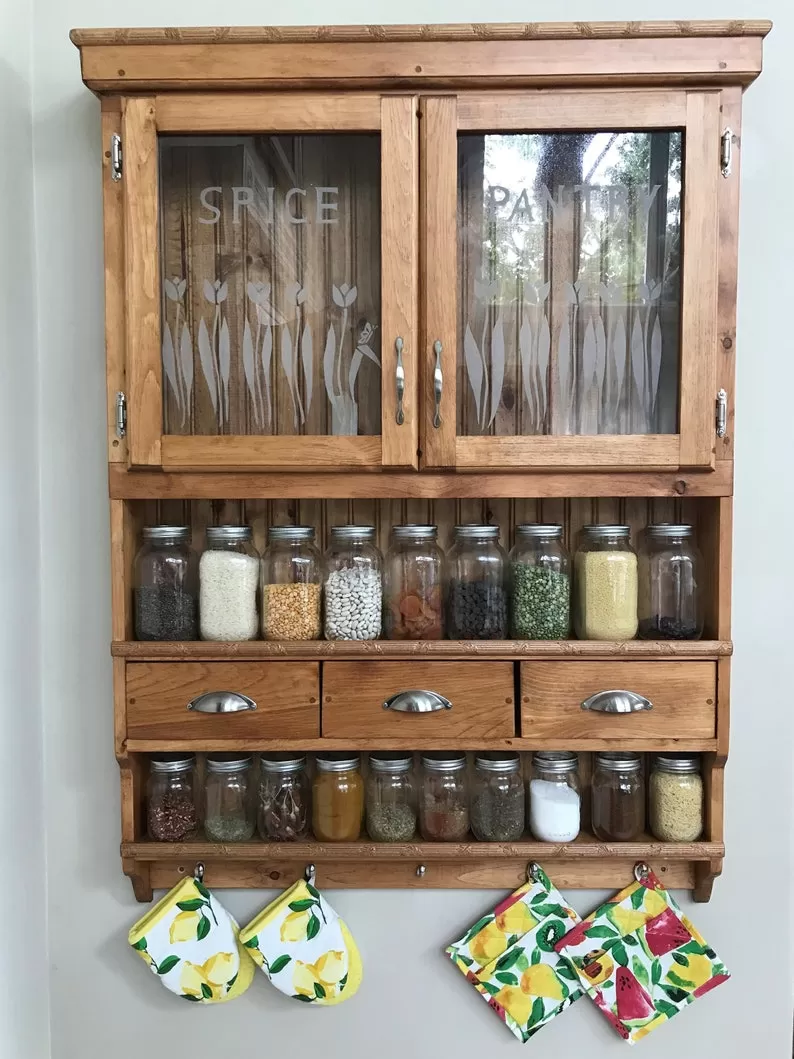 Forever Tulips, spice rack, spice pantry, spice cabinet, chefs pantry, kitchen cupboard, custom kitchen cabinet with frosted glass doors.