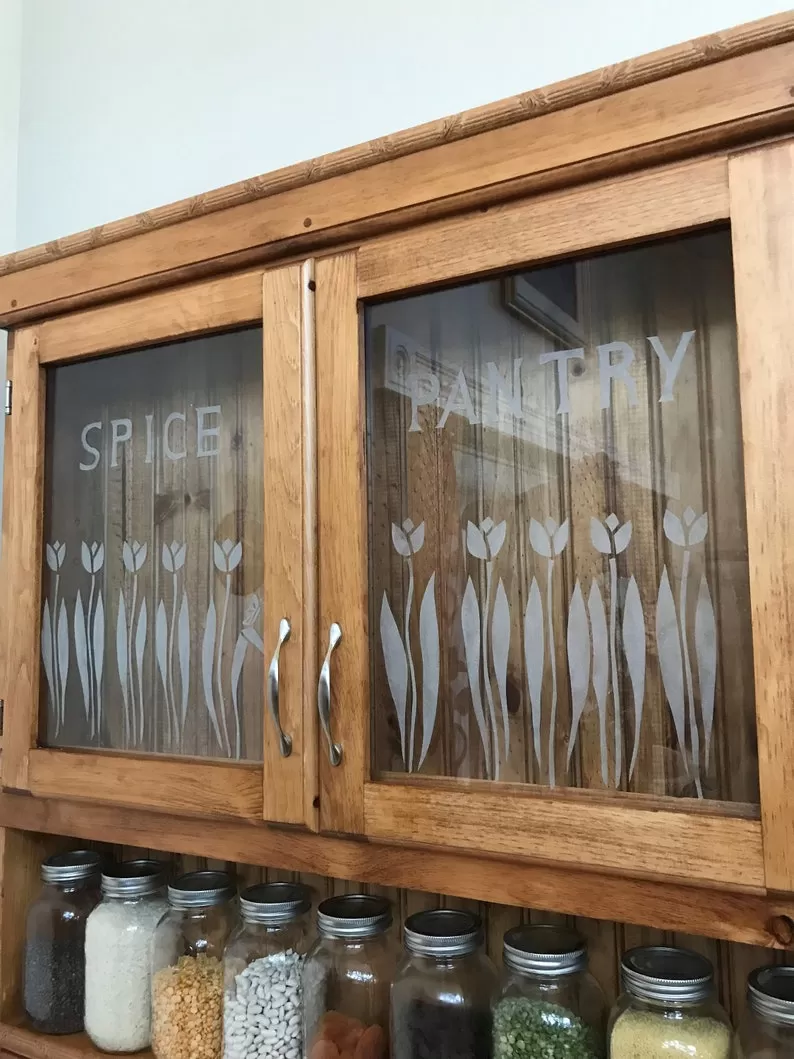 Forever Tulips, spice rack, spice pantry, spice cabinet, chefs pantry, kitchen cupboard, custom kitchen cabinet with frosted glass doors.