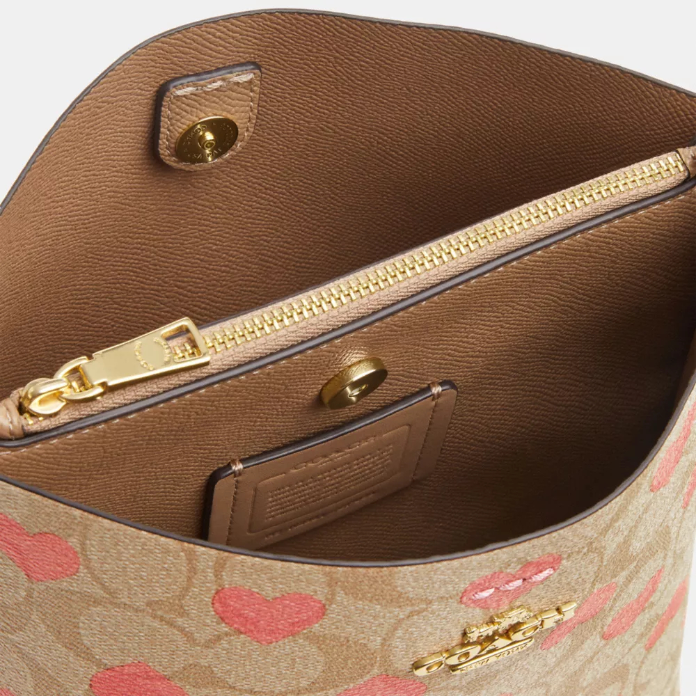 Mollie Bucket Bag 22 In Signature Canvas With Heart Print