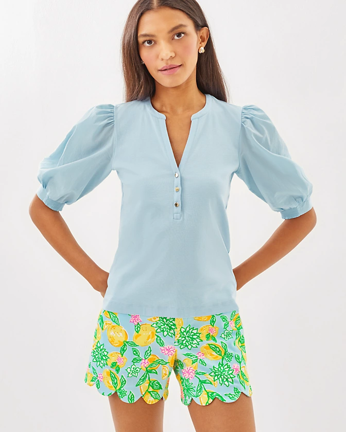 Add our versatile Ronson Knit Top to your wardrobe for easygoing style wherever the day takes you. Straight fit top with puff sleeves, smocked cuffs, buttons, and a crew notched neckline. 24