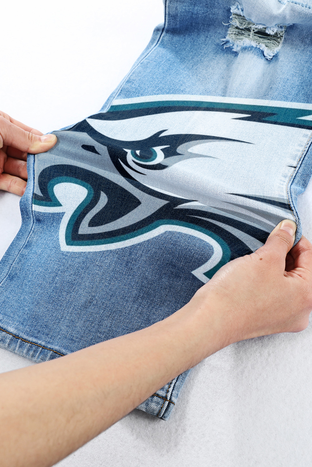 casual fashion perforated printed jeans