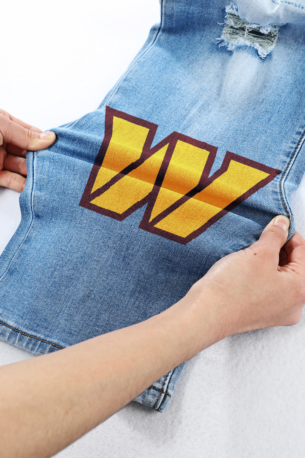 casual fashion perforated printed jeans