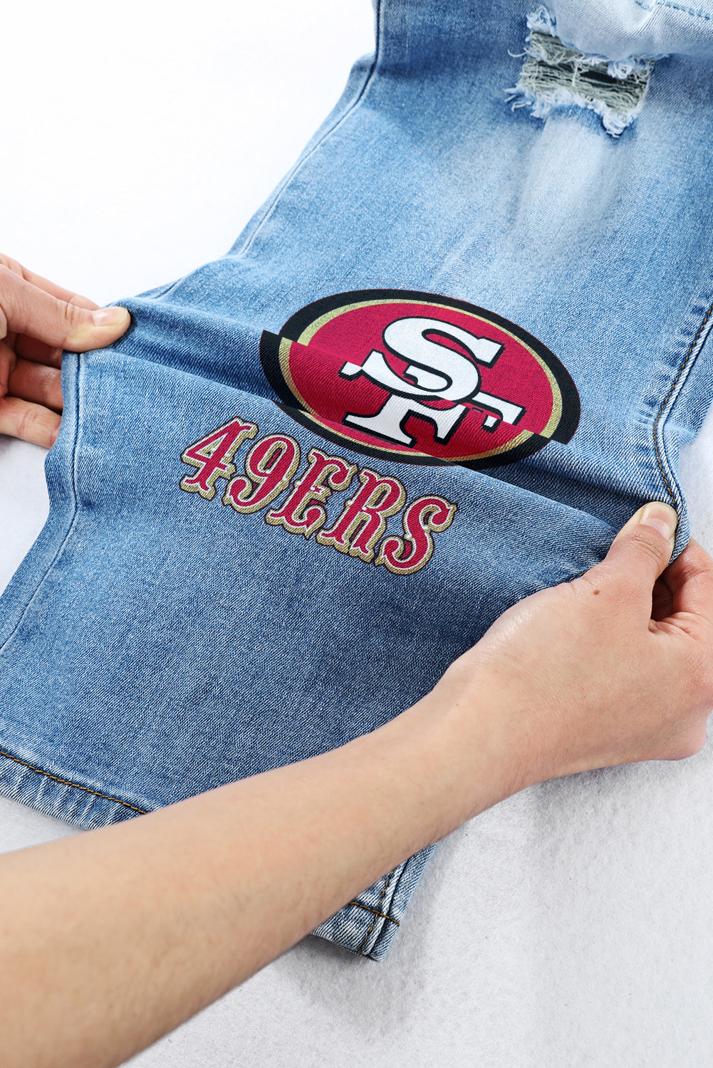 casual fashion perforated printed jeans