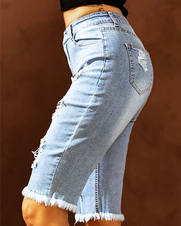 casual fashion perforated printed jeans