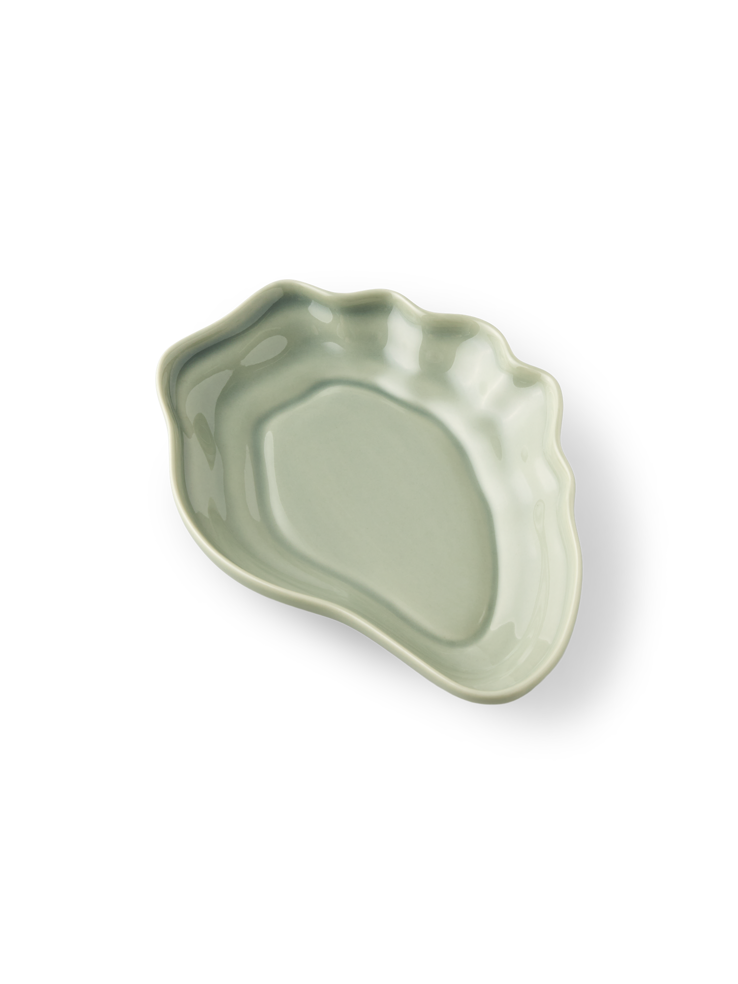 Oyster-shaped dish Stoneware. 13.2 x 18.2 cm.