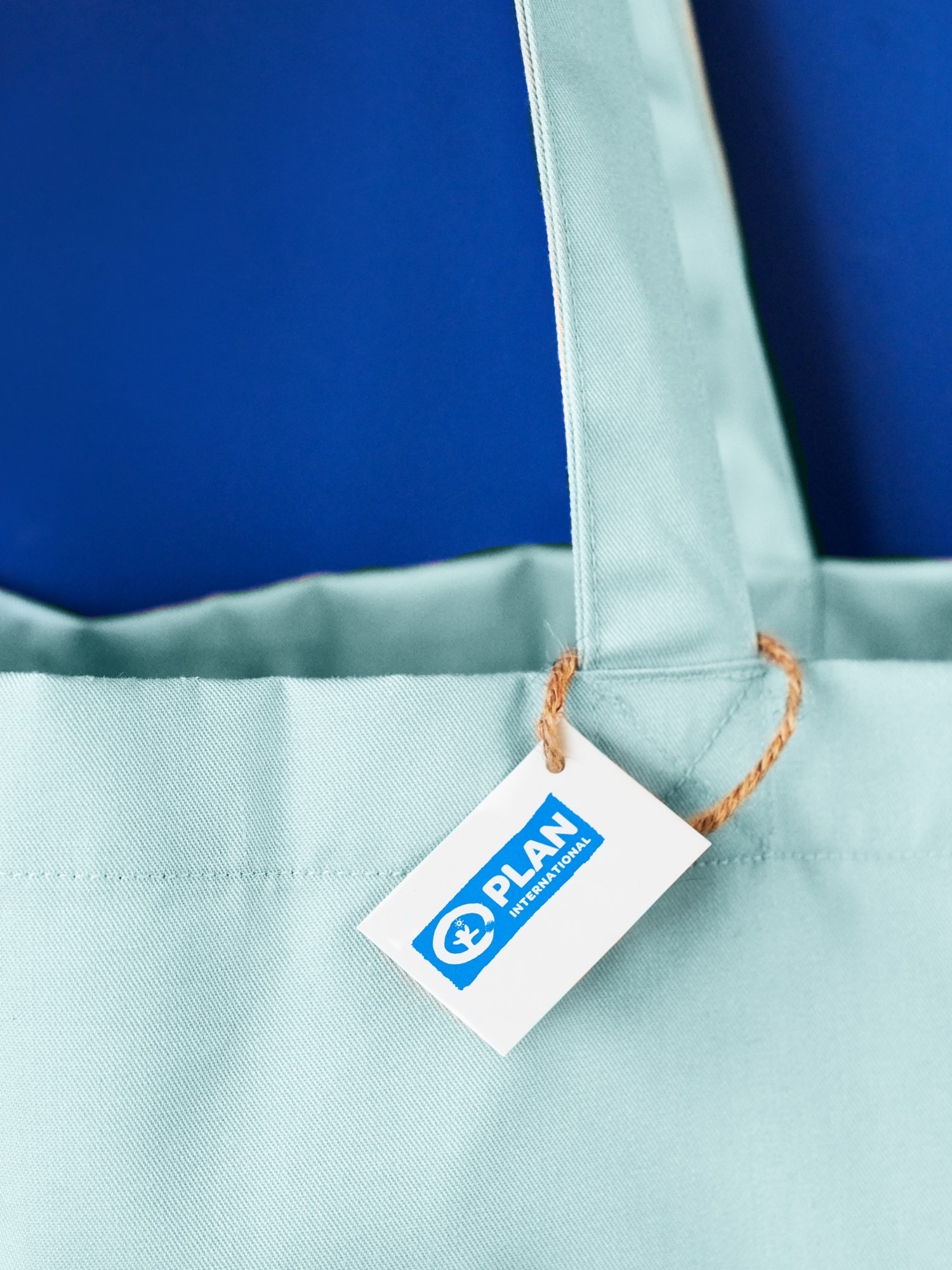 Plan International tote bag By purchasing this tote bag, you donate £0.56 / €0.67 to Plan International.