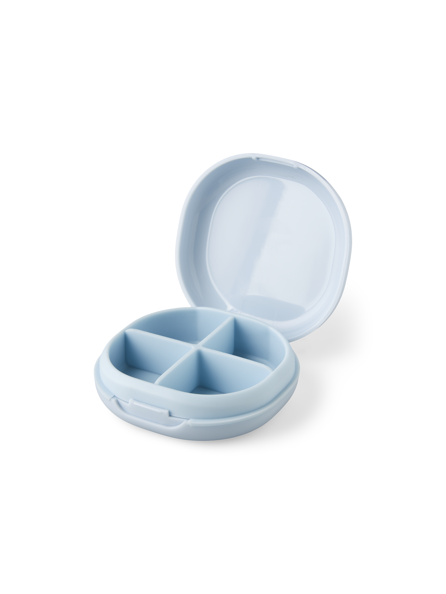 Travel pill case Polypropylene/silicone. Ø7.5 x 2.5 cm.