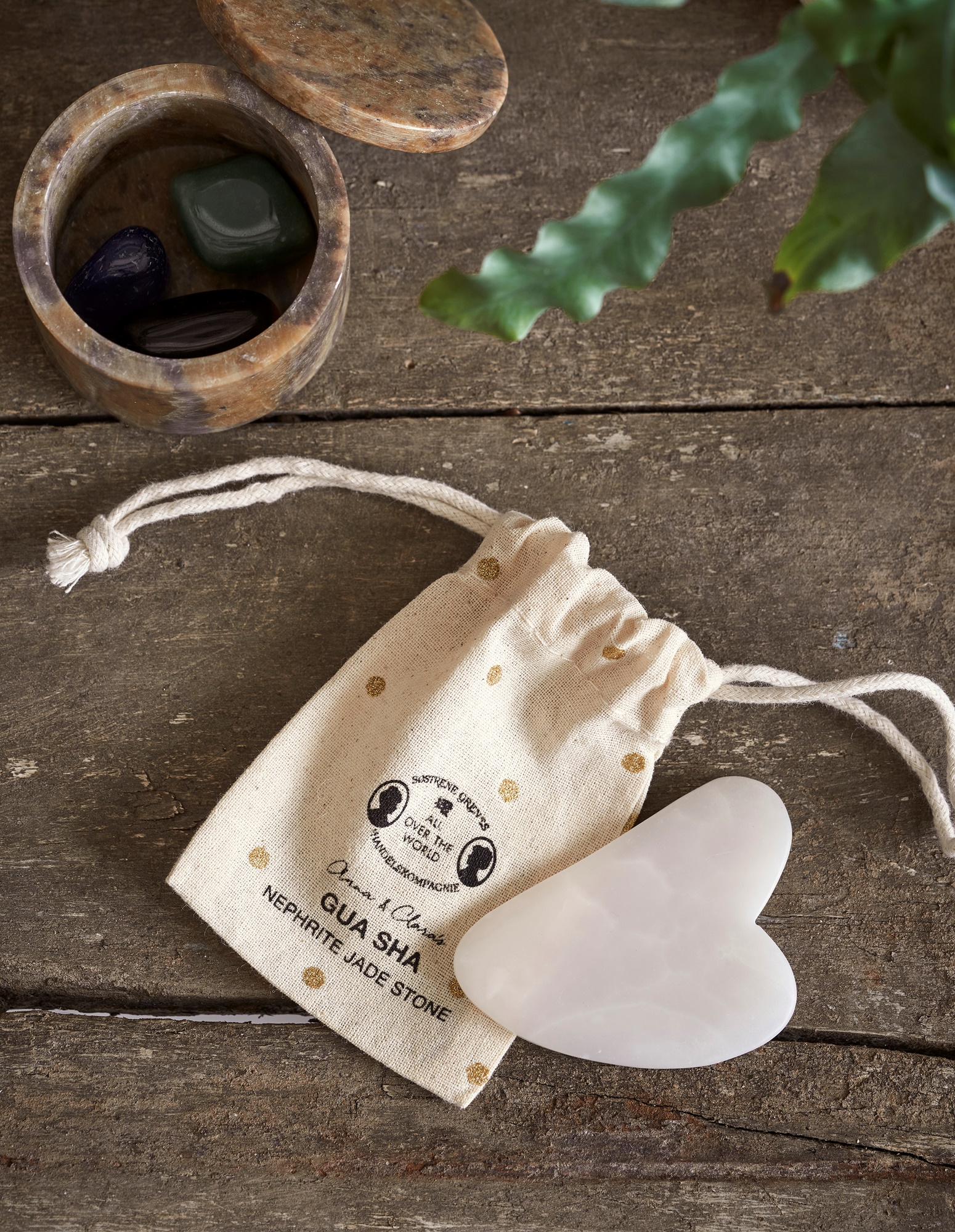 Gua sha stone Nephrite jade. 2 x 5.6 x 14.5 cm.