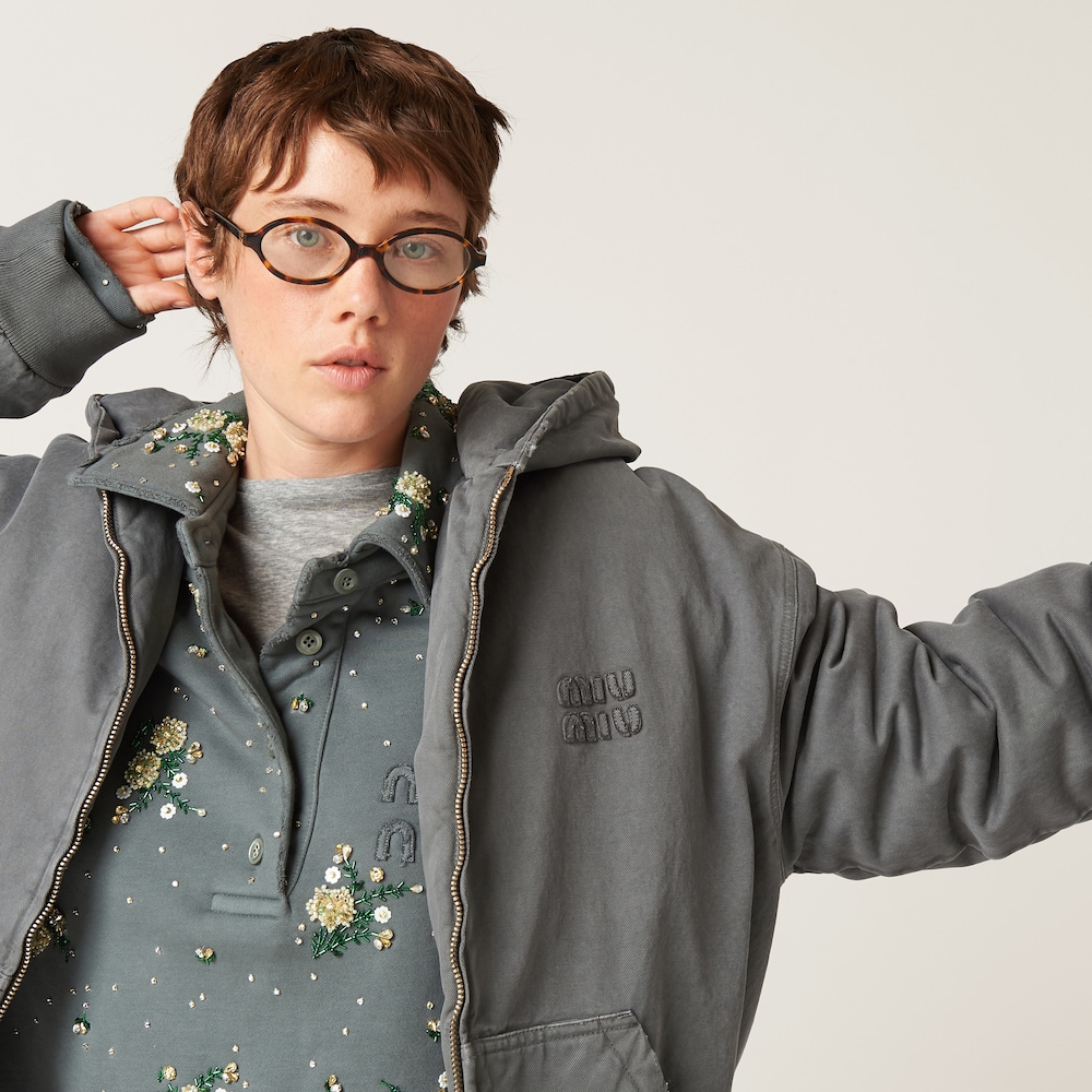 Garment-dyed blouson jacket with embroidered logo