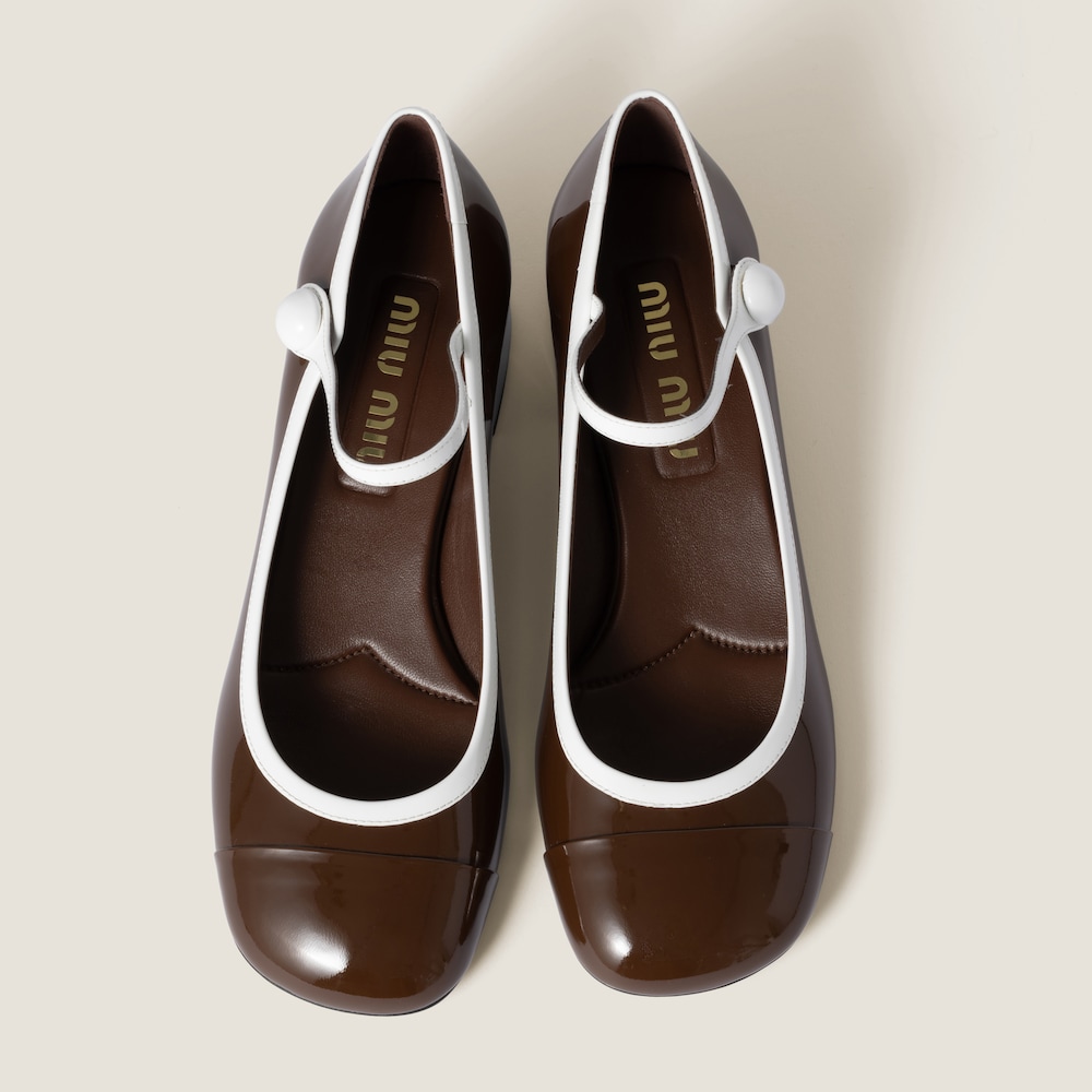 Two-tone patent leather Mary Jane pumps