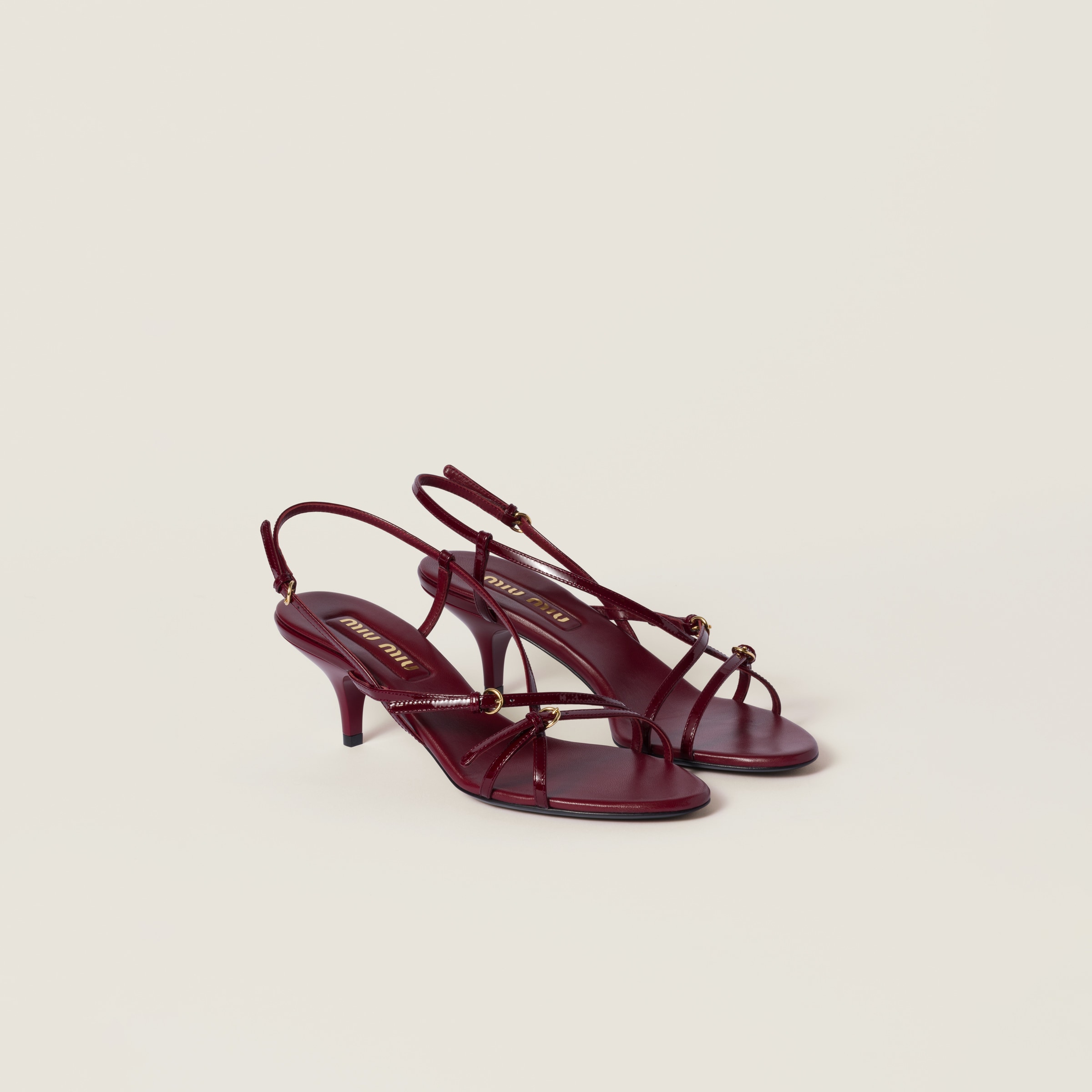 Patent leather sandals with buckles