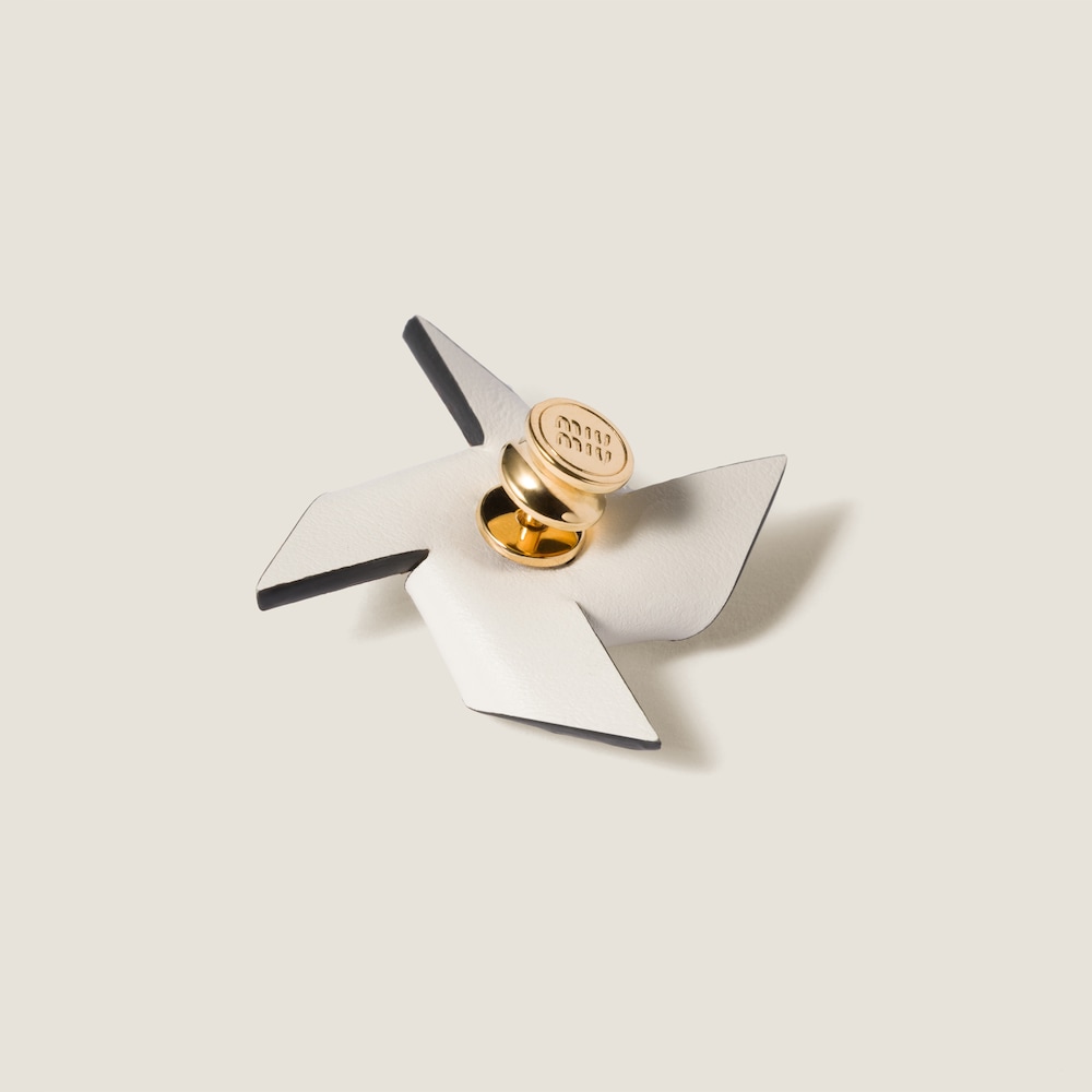 Leather pinwheel brooch