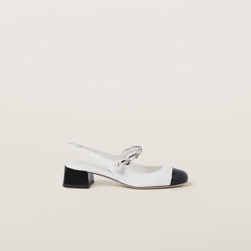 Two-tone patent leather slingback pumps