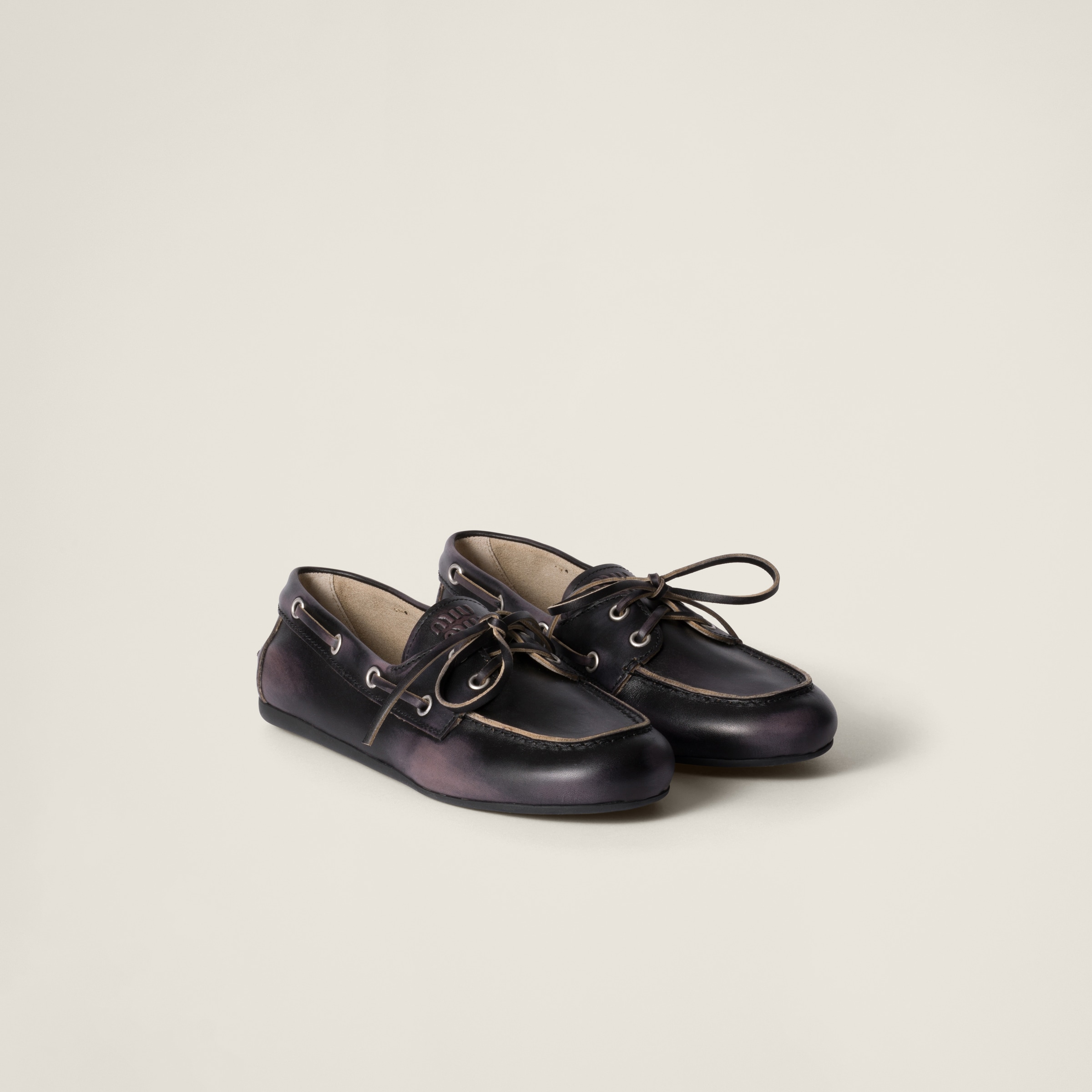 Unlined bleached leather boat shoes
