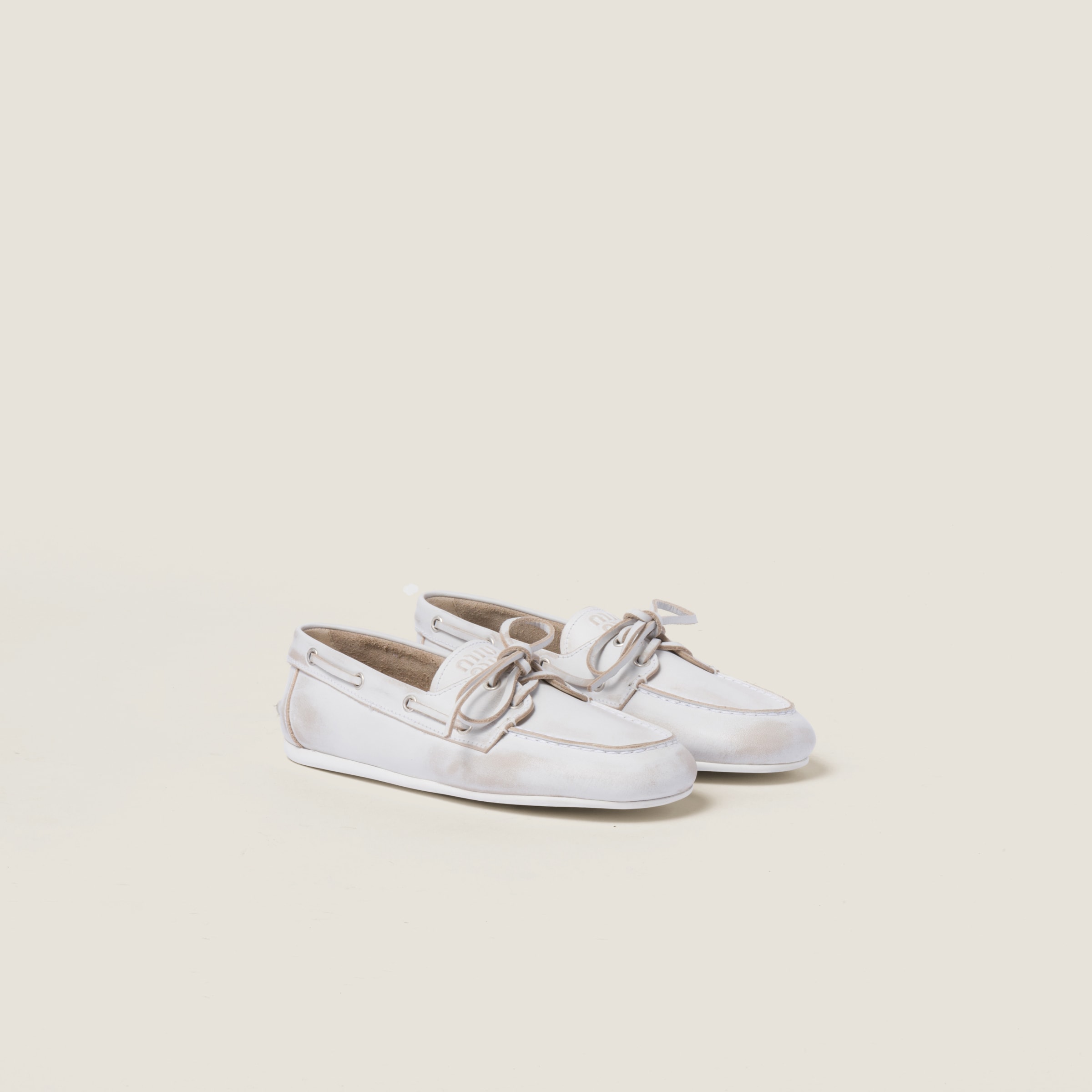Unlined bleached leather boat shoes