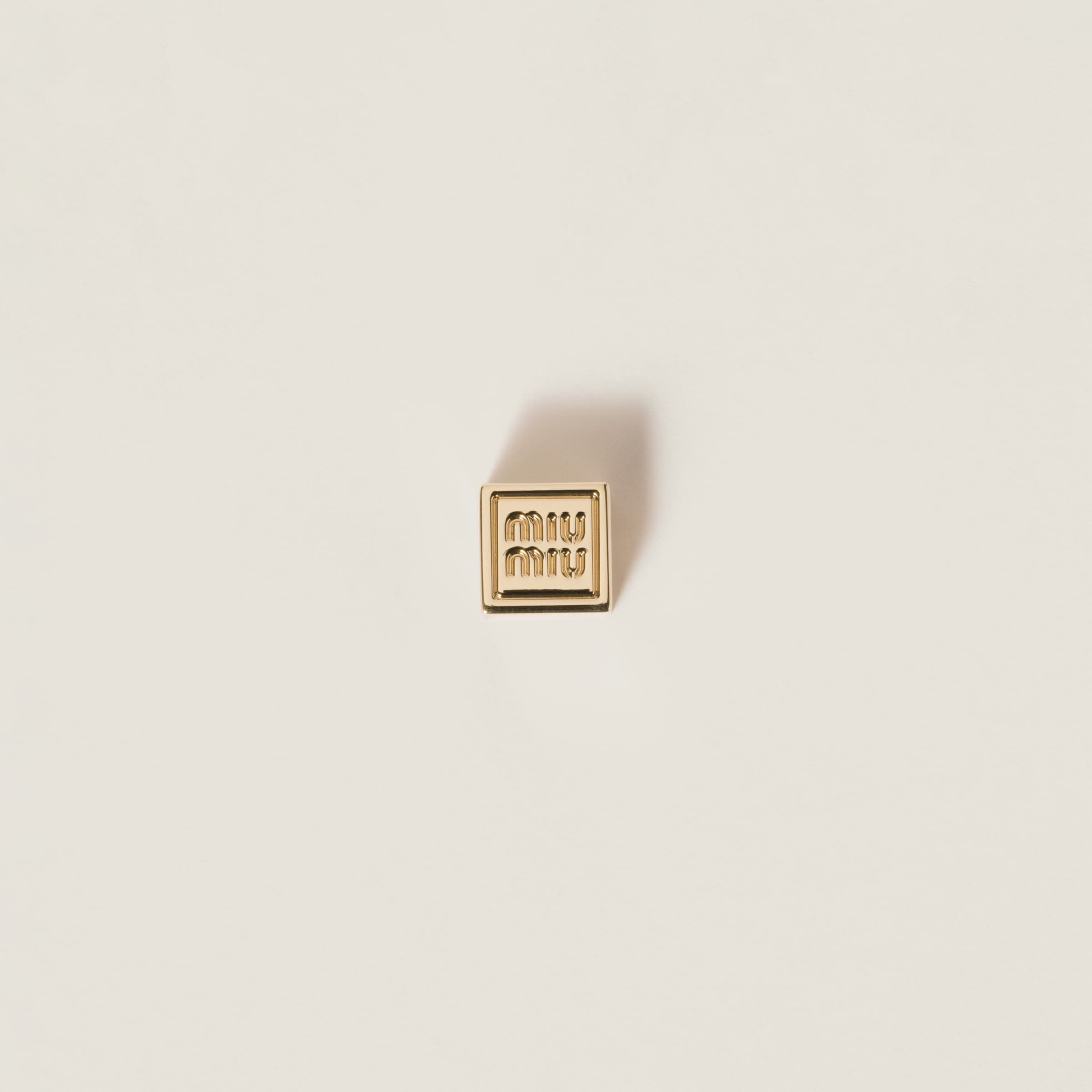 Dice charm with logo