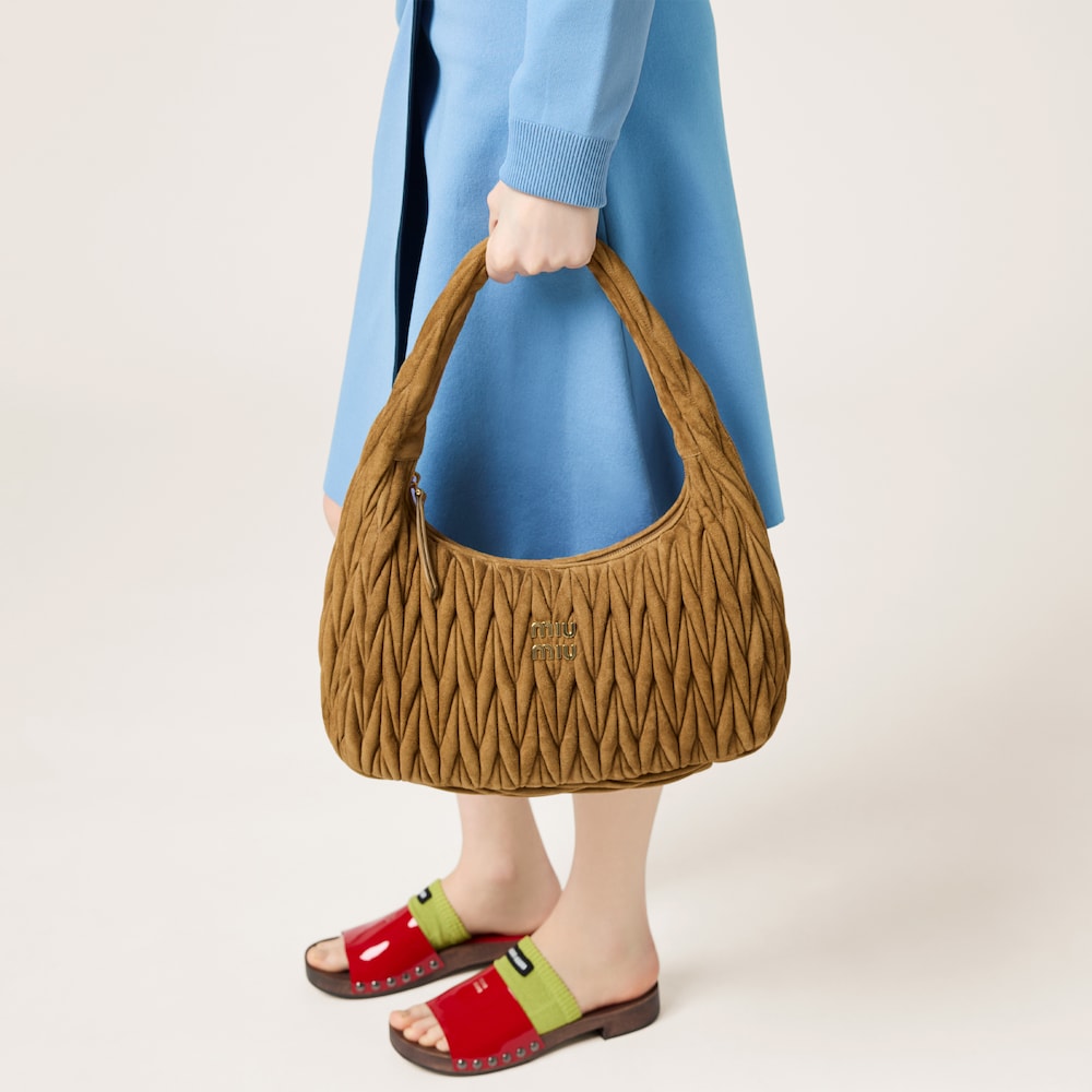 Wander matelassé suede bag