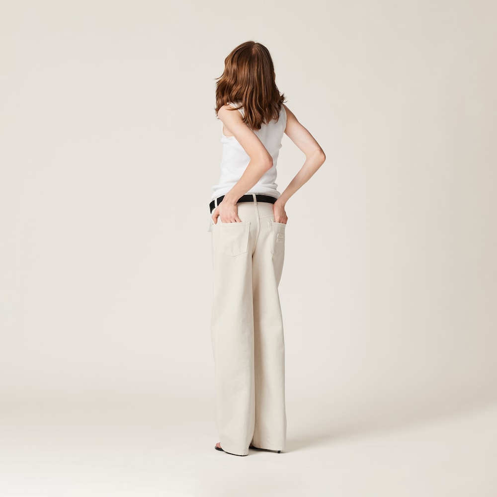 Five-pocket ecru denim jeans