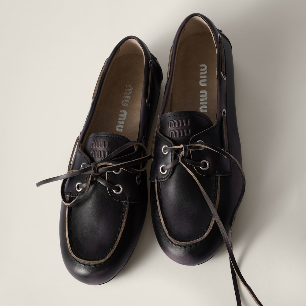 Unlined bleached leather boat shoes
