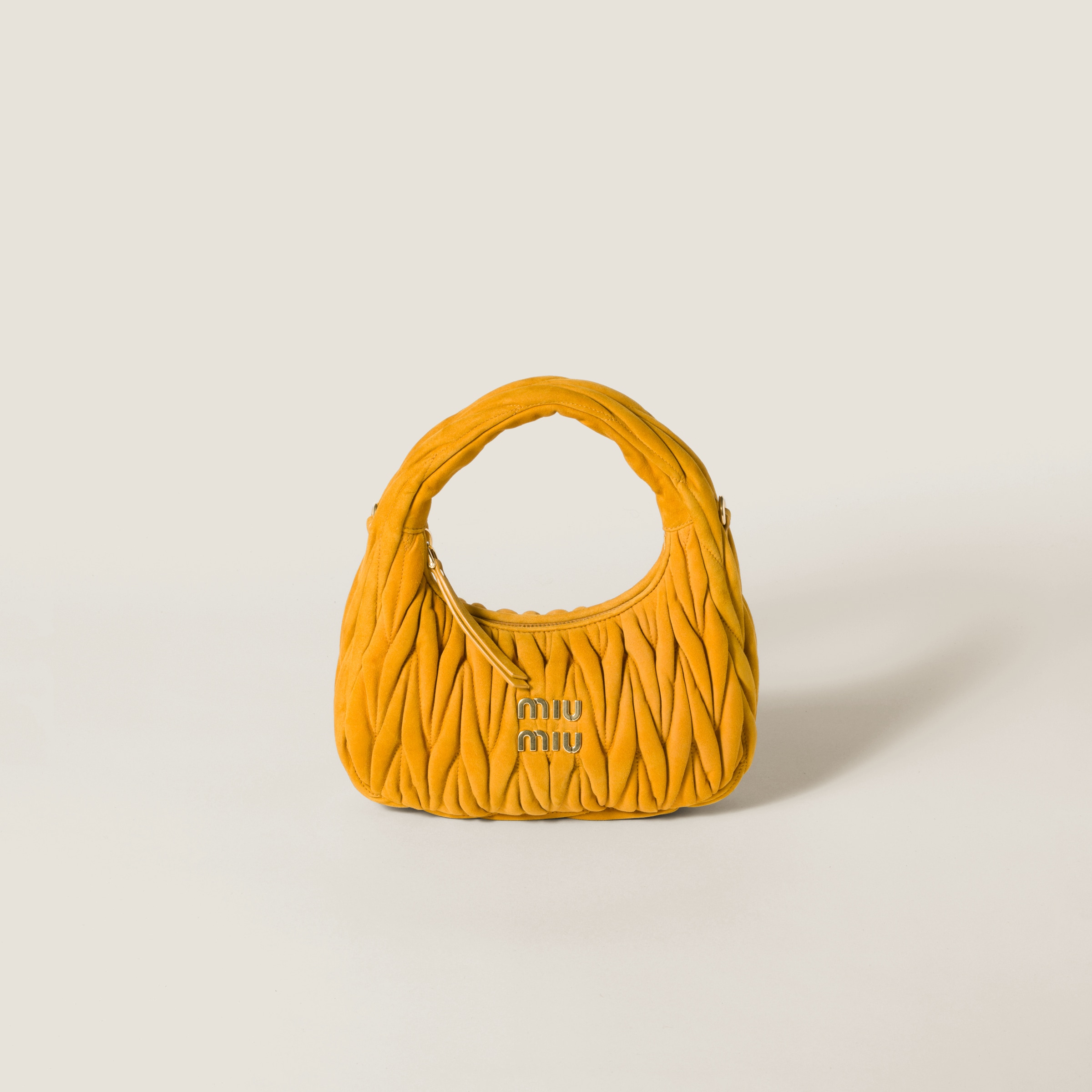 Wander matelassé suede bag