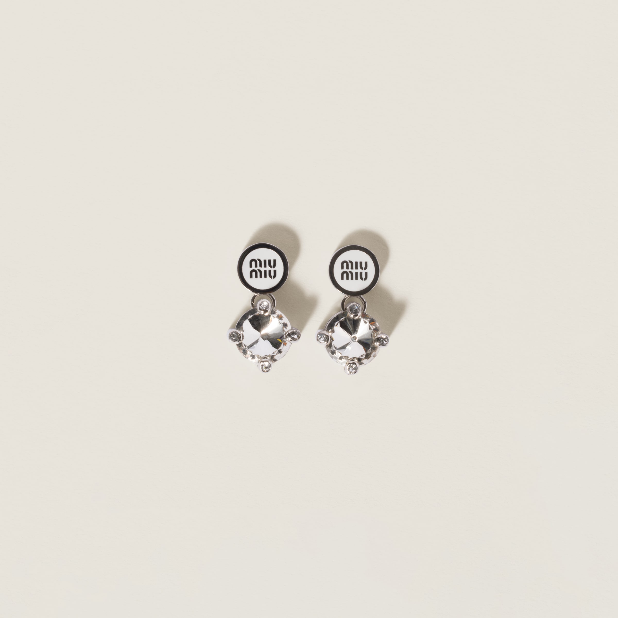 Metal earrings with crystals