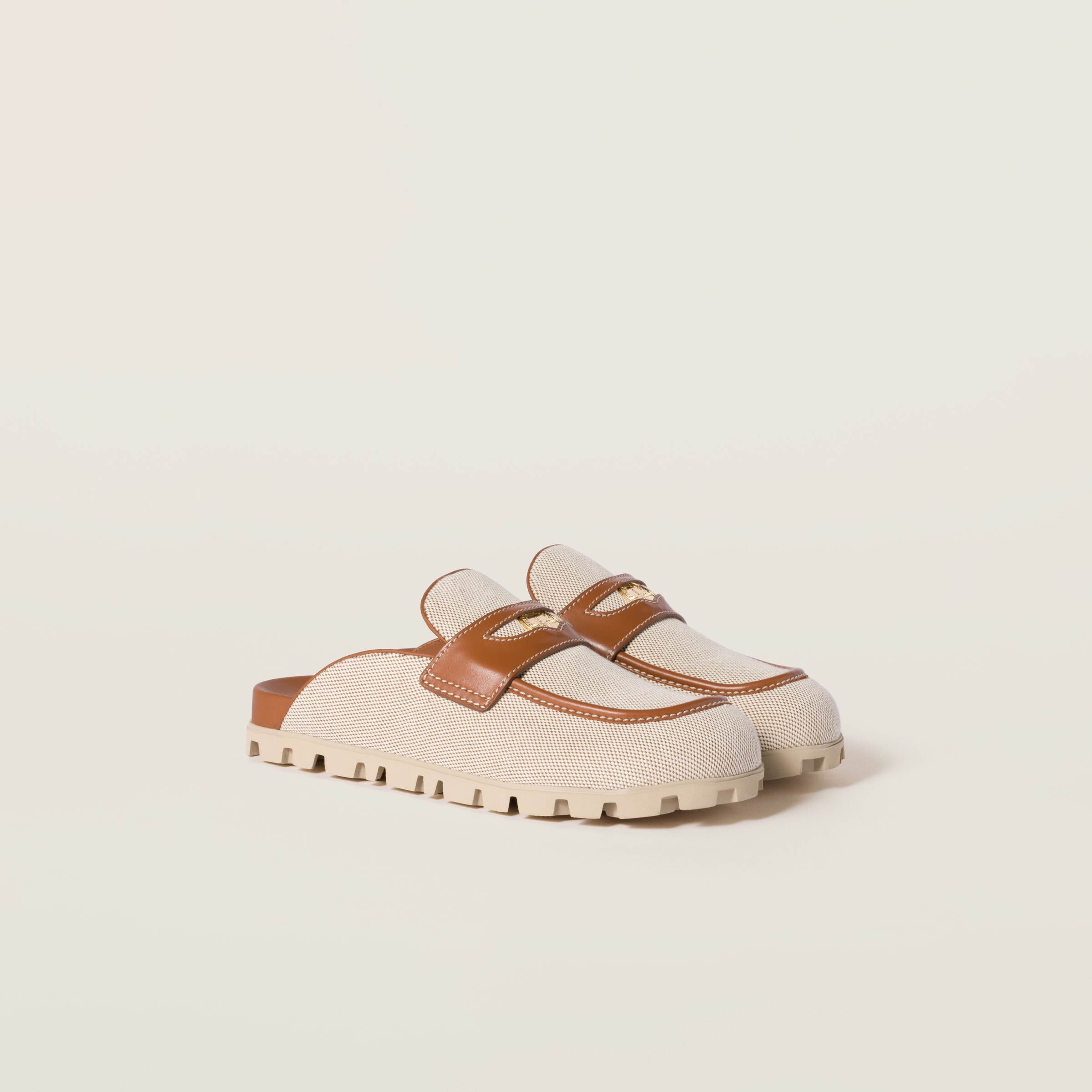Canvas and leather mules