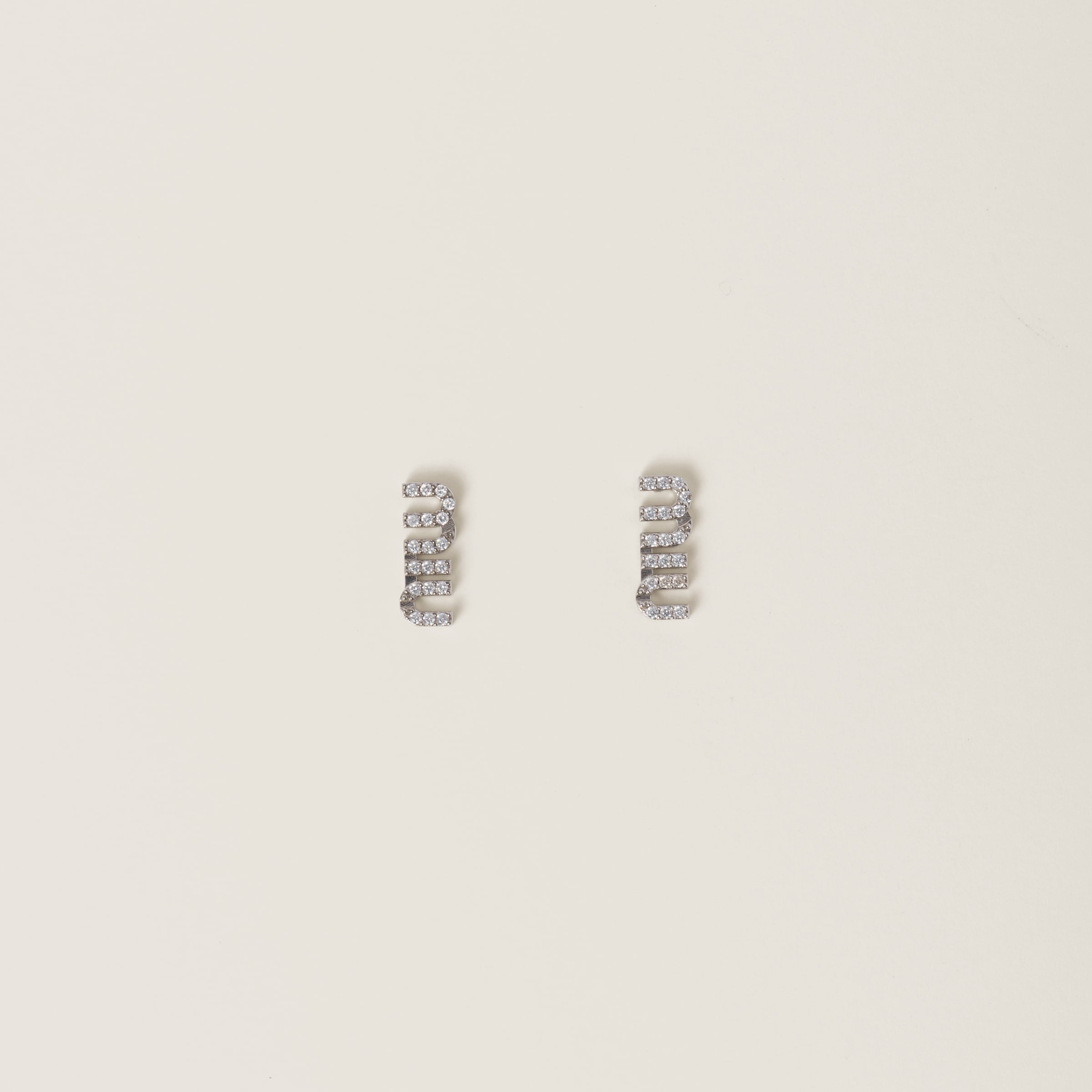 Metal earrings with crystals