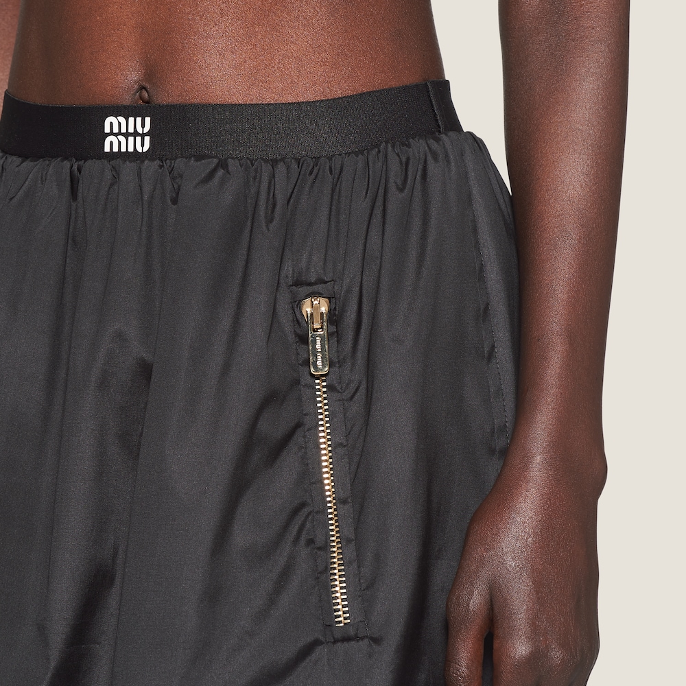 Technical silk miniskirt