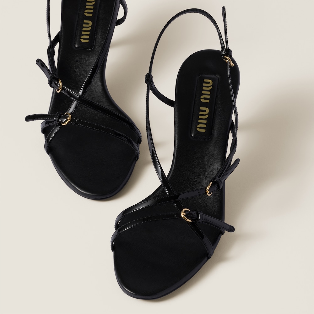 Patent leather sandals with buckles