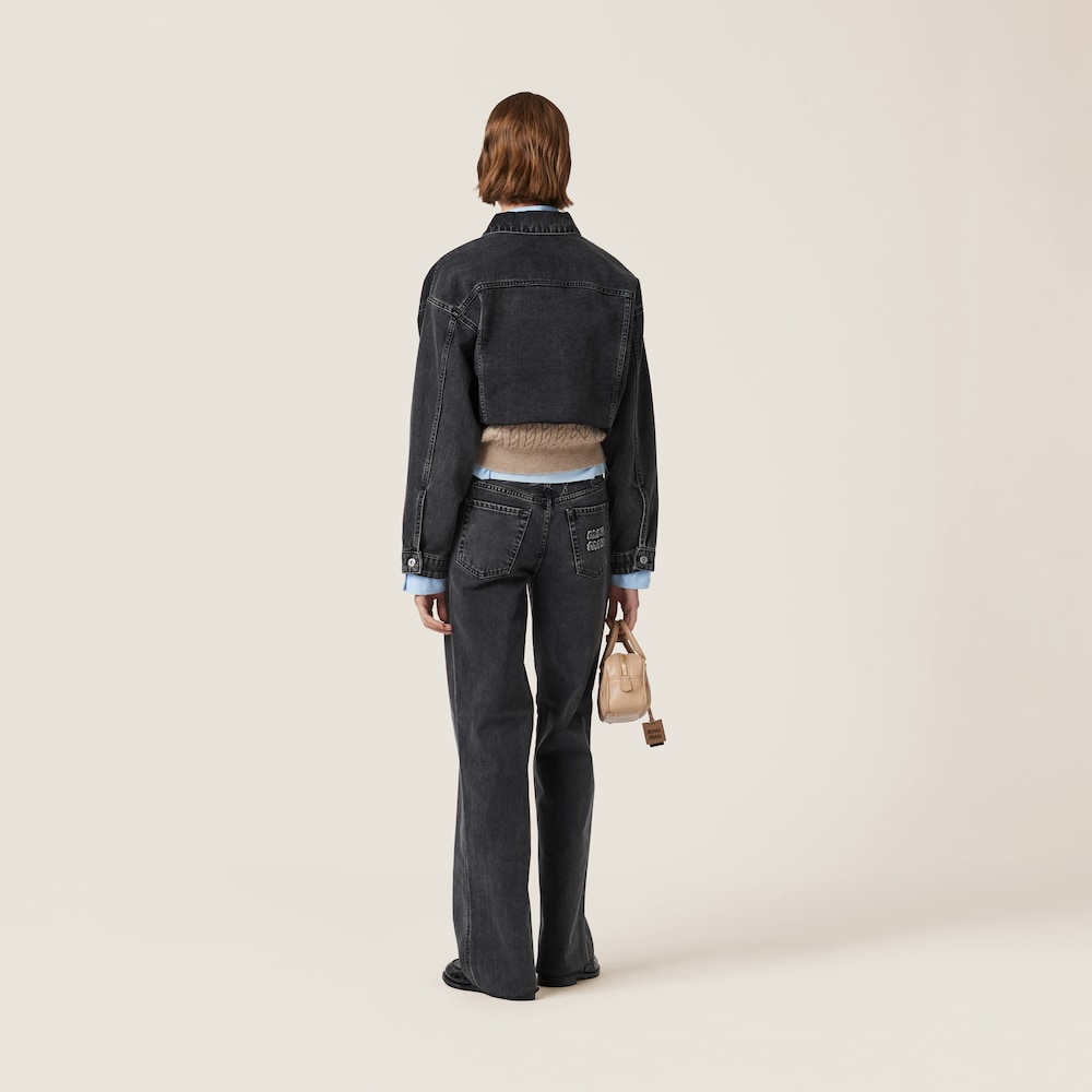 Five-pocket black denim jeans