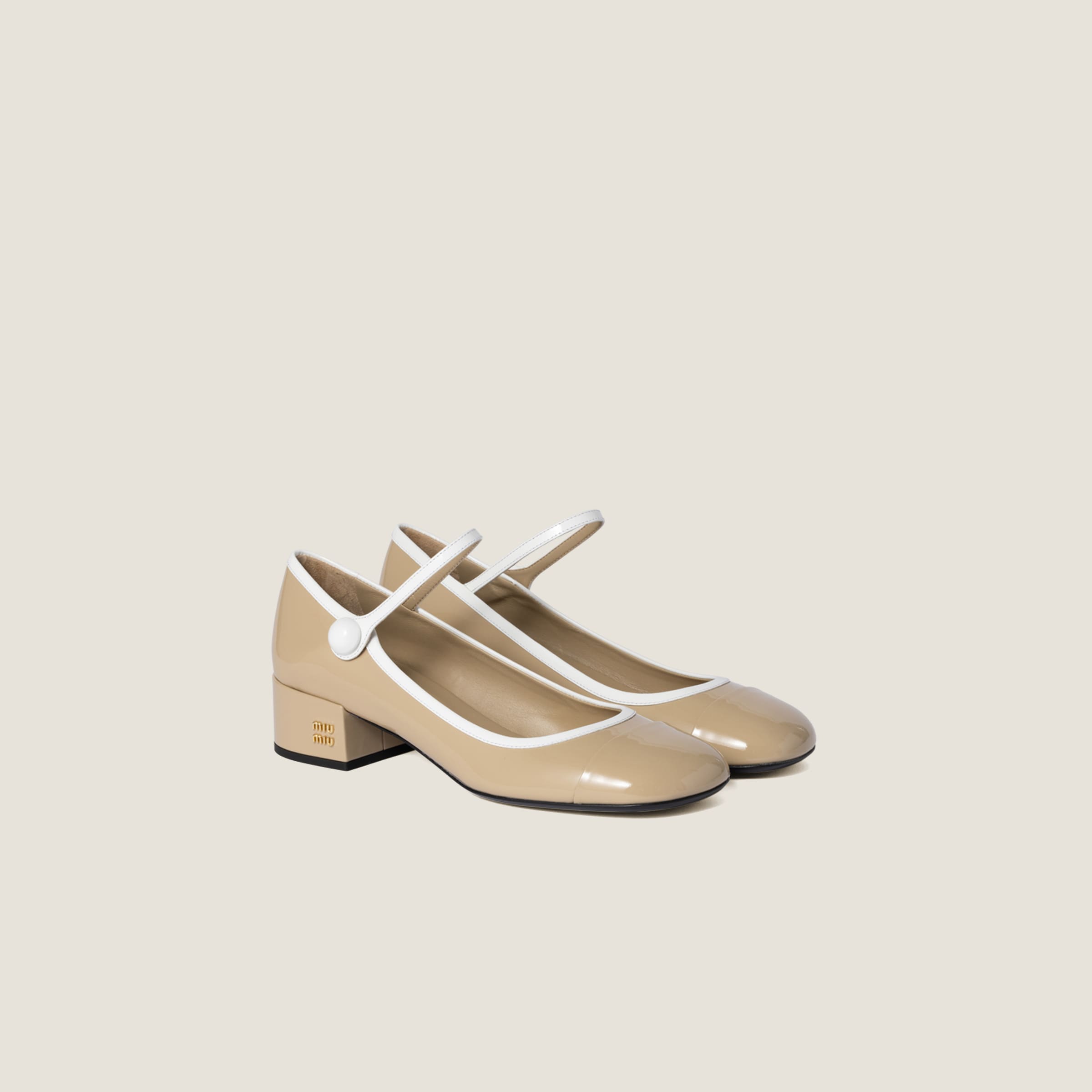 Two-tone patent leather Mary Jane pumps
