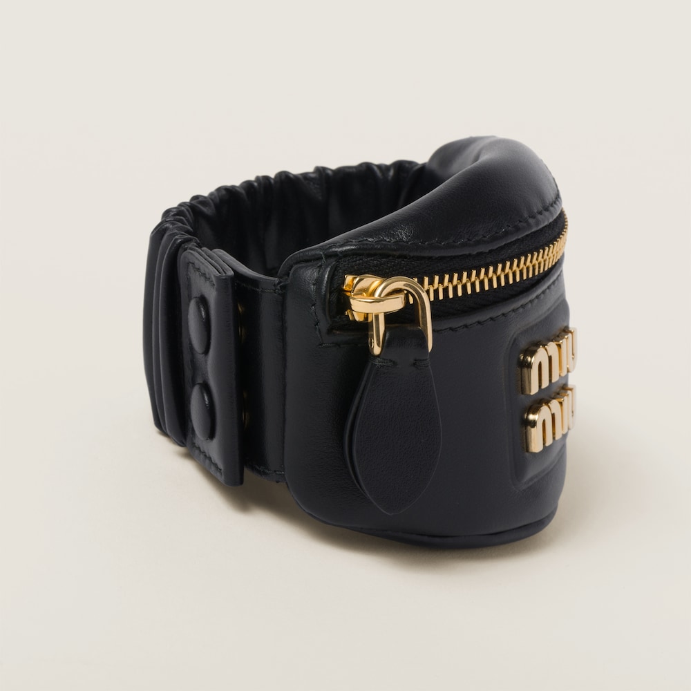 Bracelet with leather mini-pouch