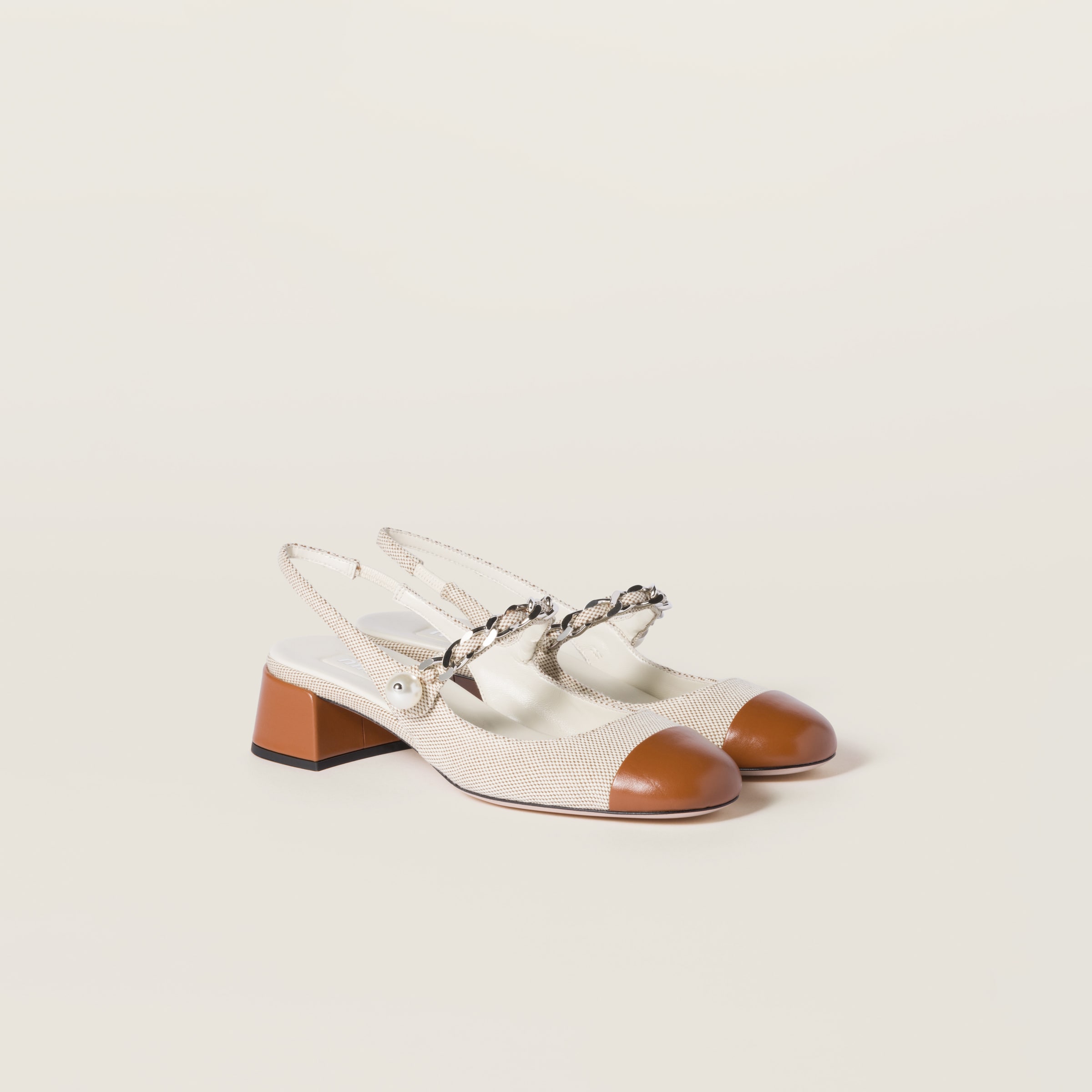 Canvas and leather slingback pumps