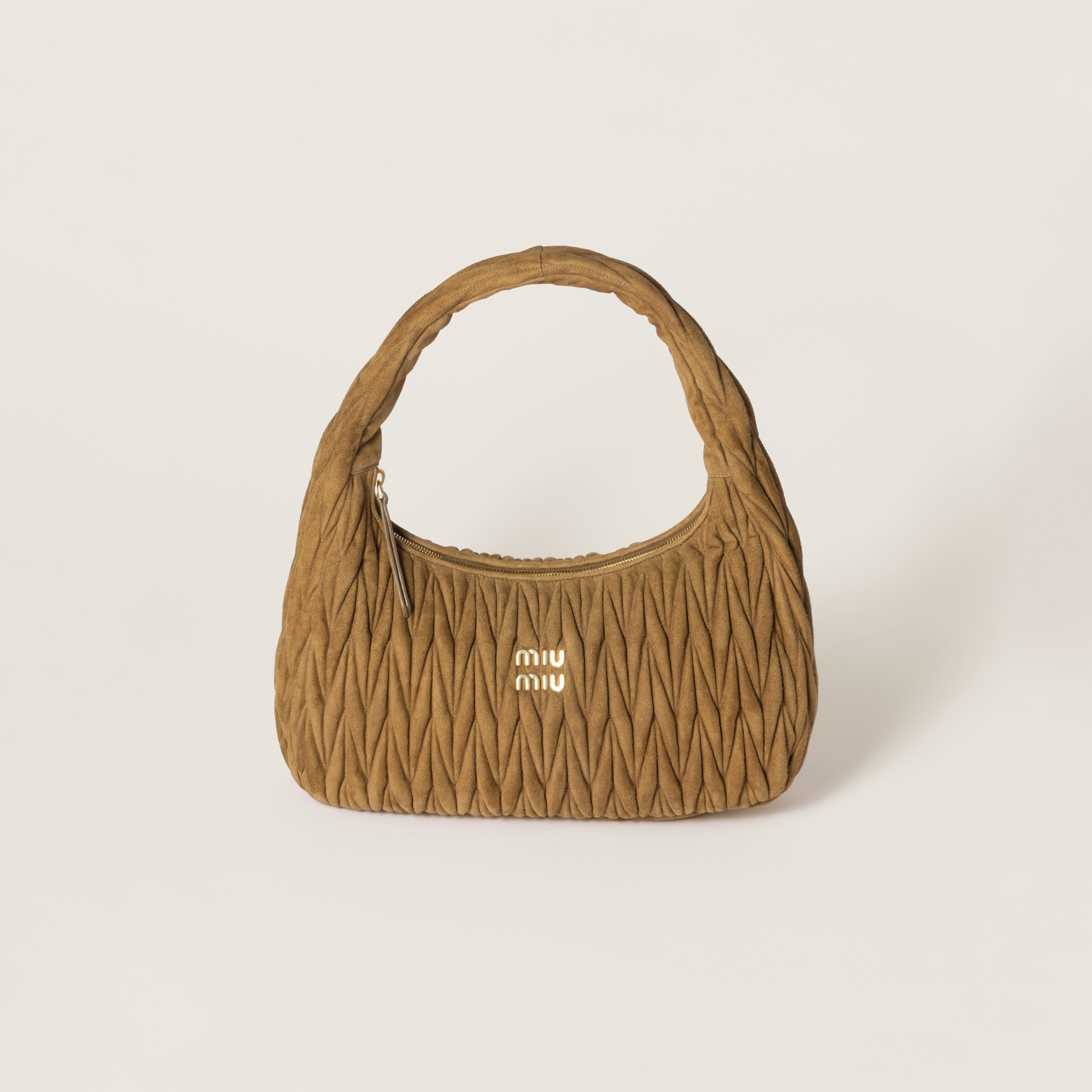 Wander matelassé suede bag